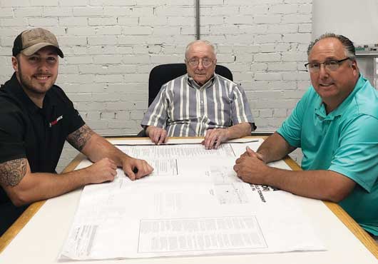 Timbers Building Co. is led by Dan Palmer Jr. (left) with expert support from his uncle Bill Palmer Sr. (center) and his dad, Dan Palmer Sr. (right).
